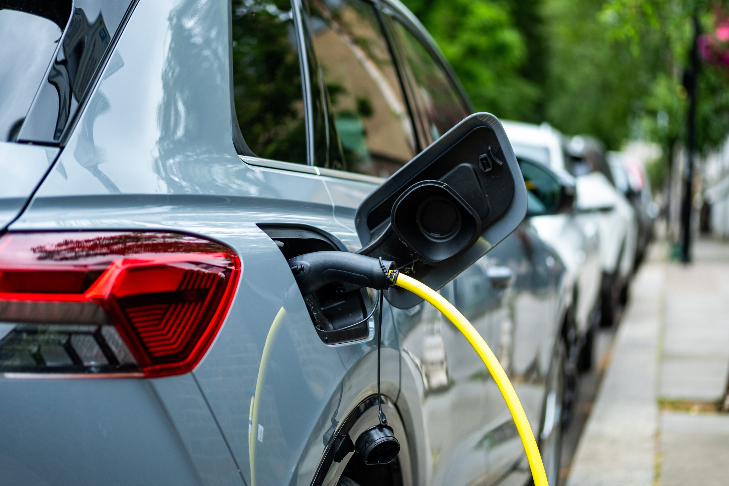 Image of an electric vehicle on charge to showcase the advantages of electric vehicles