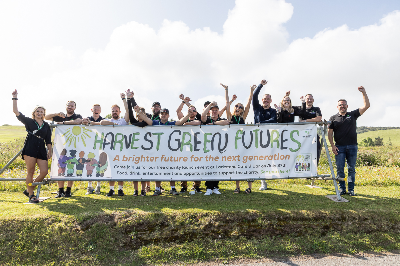 tHe team at harvest green developments behind a harvest green futures banner at the golf day