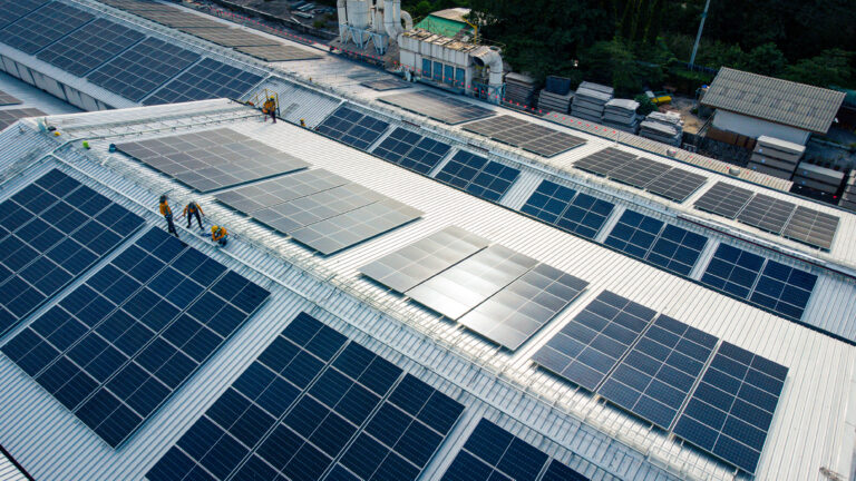 A picture of solar on a commercial roof to showcase the connection between solar and roofing
