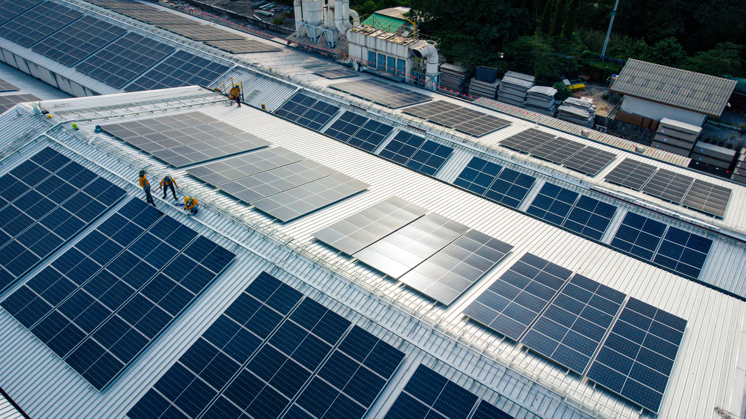 A picture of solar on a commercial roof to showcase the connection between solar and roofing